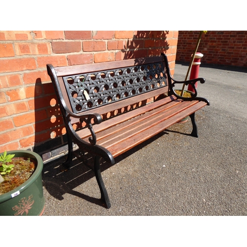51 - Cast iron wooden slatted garden bench