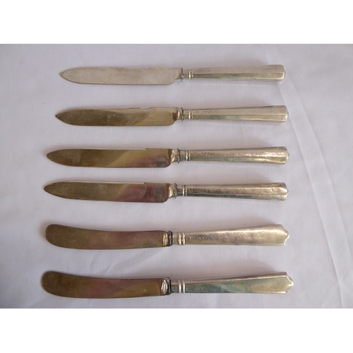 61 - Silver handled knives