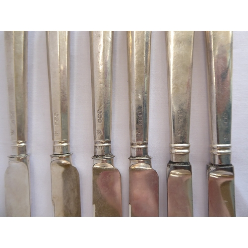 61 - Silver handled knives