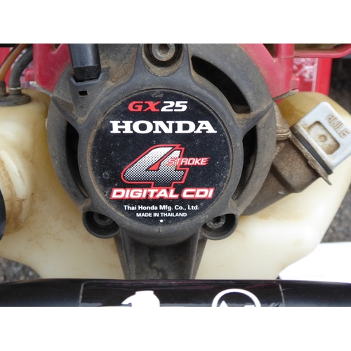 29 - Honda FG110 petrol motor hoe/scarifier