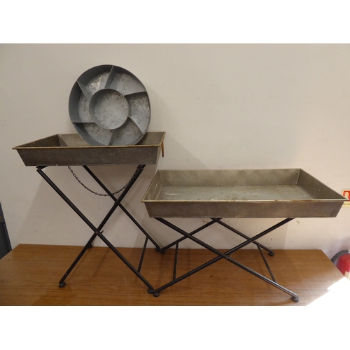 42 - Zinc garden butlers trays on folding metal stands (2) and circular herb planter