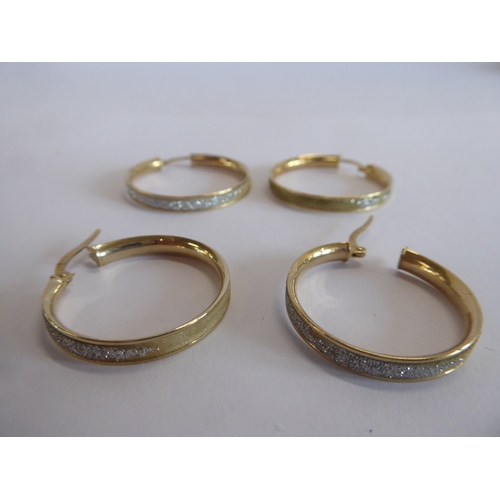 37 - 2 pairs of 9ct gold and glitter hoop earrings (5g)