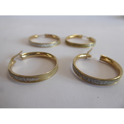 37 - 2 pairs of 9ct gold and glitter hoop earrings (5g)