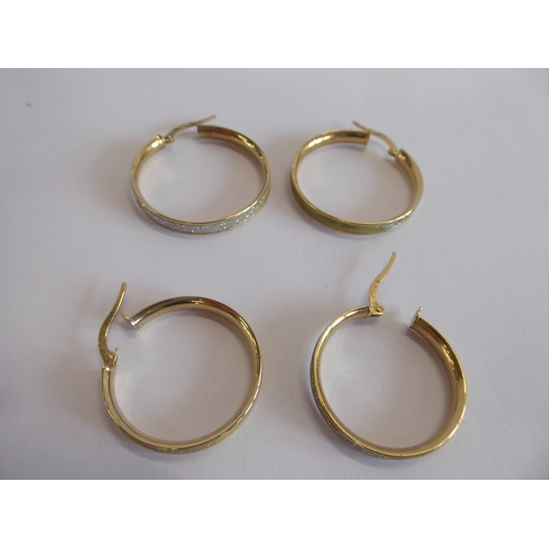 37 - 2 pairs of 9ct gold and glitter hoop earrings (5g)