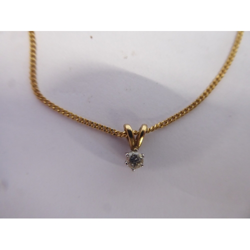39 - Solitaire diamond pendant on 9ct gold chain (1.9g)