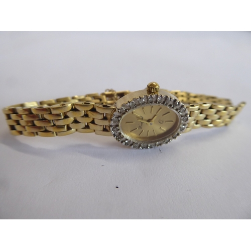 55 - Woodford 14ct gold and diamond cased ladies wristwatch (broken strap)