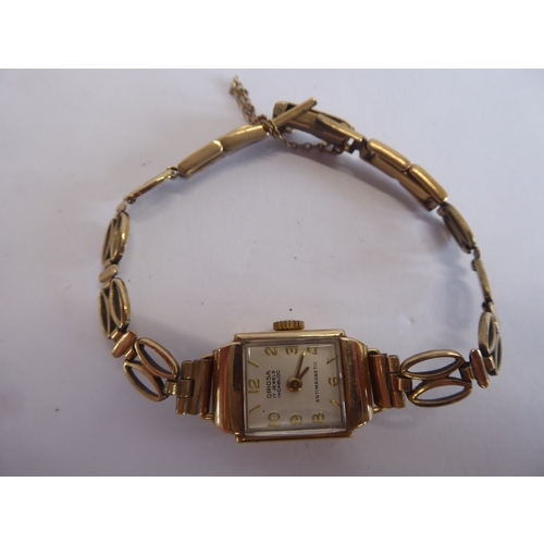 56 - Oriosa 9ct gold bracelet wristwatch (10g without movement)