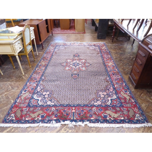 Pink ground Afghan rug with animal and bird border (124