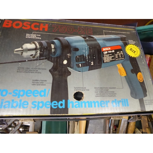 Crates of tools, heavy duty masonry drill bits, Bosch drill, Black ...