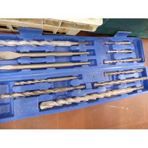 Crates of tools, heavy duty masonry drill bits, Bosch drill, Black ...
