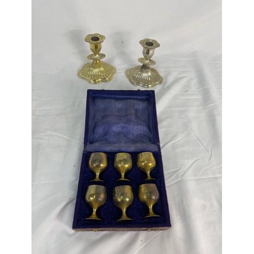 5 - 2 x Silver Plated Candlesticks and a Canteen of Silver Plated Goblets