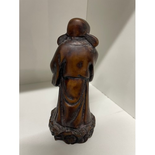 202 - Resin Chinese Man Holding A Baby