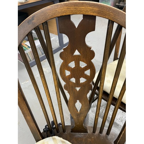 220 - 4 x Antique Wheel back Dining Chairs