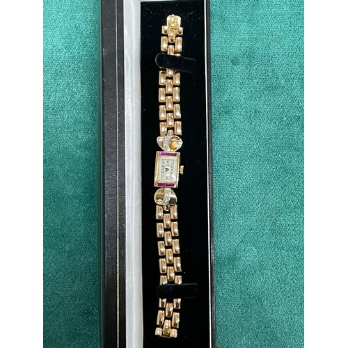 169 - Vintage Norma 18k Gold, Ruby & Diamond Ladies Watch.
18k Gold Bracelet & Case 14mm x 20mm. Diamond D... 