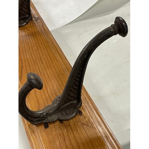 11 - Set of 6 Victorian Cast Iron Coat Hooks On Wood Plinth