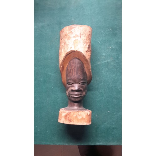 160 - Hand carved African ebony sculpture made from a single piece of wood.