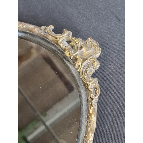 1 - A vintage Ornate Oval Gilt mirror