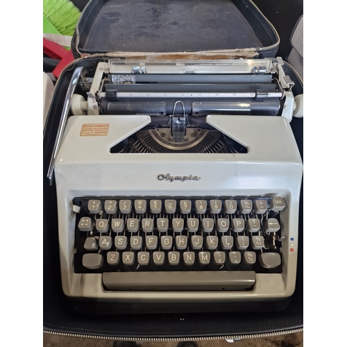 13 - A vintage Olympia type writer