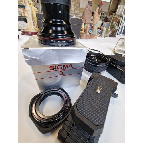 32 - A bundle of camera equipment including sigma wide Angel convertor and a Sony widewide conversion len... 