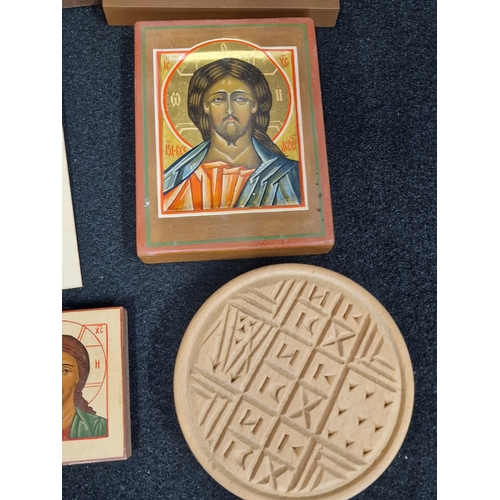 51 - A selection of religious Icon plaques and a loom woven picture