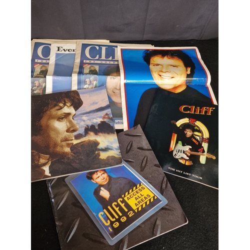 59 - A collection of Cliff Richard memorabilia including tour programmes and posters