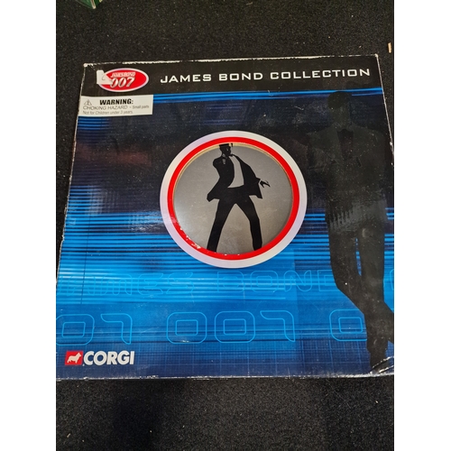 78 - Corgi James bond collection. TY99135 James Bond film canister 8 piece gift set