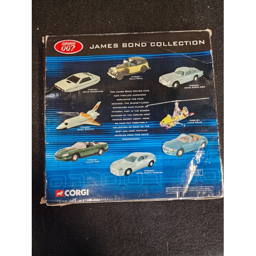 78 - Corgi James bond collection. TY99135 James Bond film canister 8 piece gift set