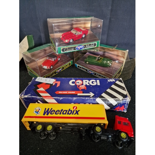 79 - A collection of Corgi classic model cars and Vintage weetabix truck