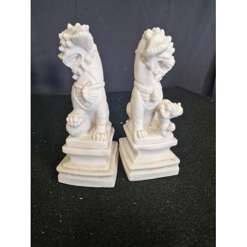 96 - A pair of Chinese Alabaster Foo Dogs