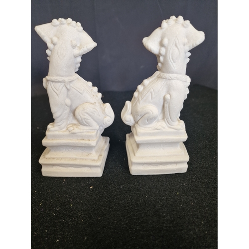 96 - A pair of Chinese Alabaster Foo Dogs