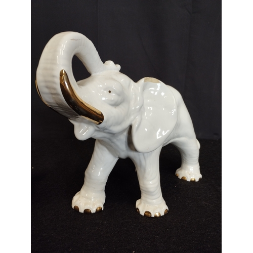 107 - Pair of Pot Elephants With Golden Tusks