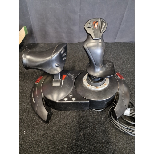 124 - Thrustmaster T-flight Hotas X gamers joysticks. For the PC or PS3