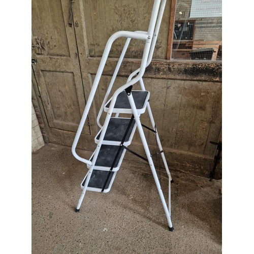 138 - A set of four step handled folding ladder
