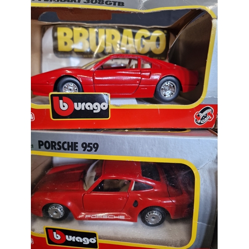 143 - A collection of Burago cars boxed. Including porsche 959, ferrari 308gtb & 456 GT