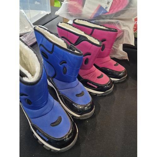 144 - 6 pairs of snow boots various sizes Pink and Blue.