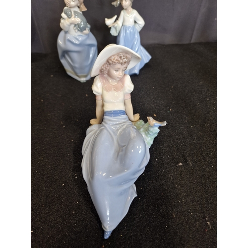 150 - Three NAO figurines by Lladro