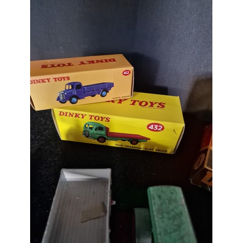 111 - A selection of vintage Dinky cars and trucks