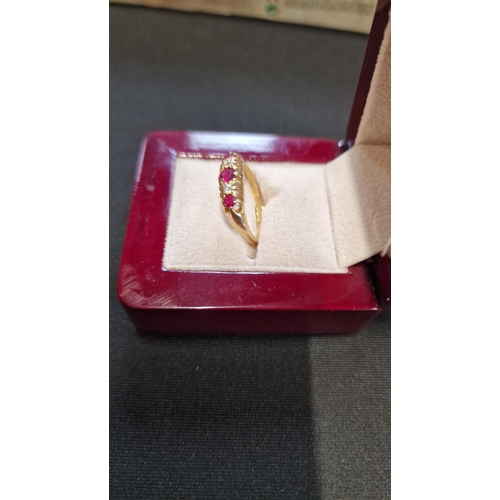 62 - A 18ct Ruby and Diamond ladies ring. 
Size N 1/2
Weight 2.88g