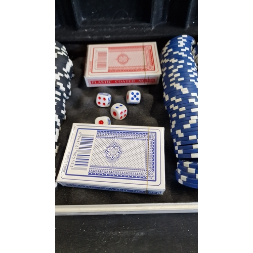 74 - Poker set with cards, dice, and case