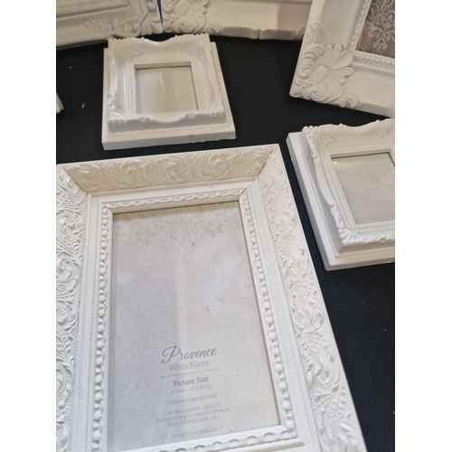 114 - Wall hanging or free standing pictures frames in various sizes. Vintage style