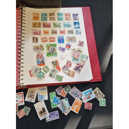 117 - A selection of mixed stamps and a Stanley Gibbsons Stamp Album