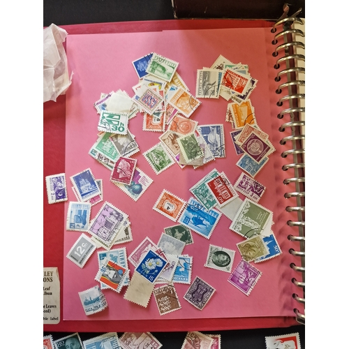 117 - A selection of mixed stamps and a Stanley Gibbsons Stamp Album