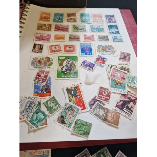 117 - A selection of mixed stamps and a Stanley Gibbsons Stamp Album