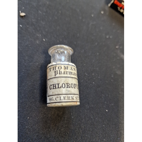 128 - Two small vinatge medicine bottles including Chloroform