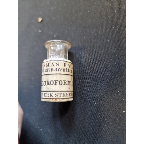 128 - Two small vinatge medicine bottles including Chloroform