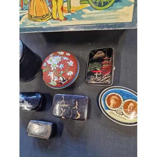 131 - A selection of trinket and pill boxes and tins.