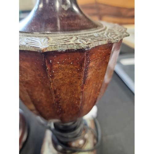 154 - Two lamps bases. One oriental style porcelingnwith brass top and the other metal with wood effect fi... 