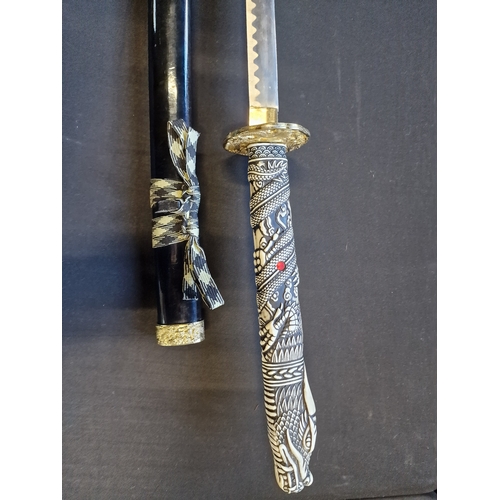 199 - Replica Higlander Katarna with resin dragon handle.