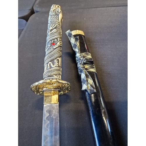 199 - Replica Higlander Katarna with resin dragon handle.