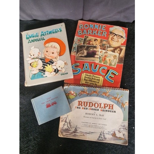 4 - Four Vintage books including Robert L. May 1939 pop up Rudolph The Red Nose Raindeer, Lucie Attwells... 